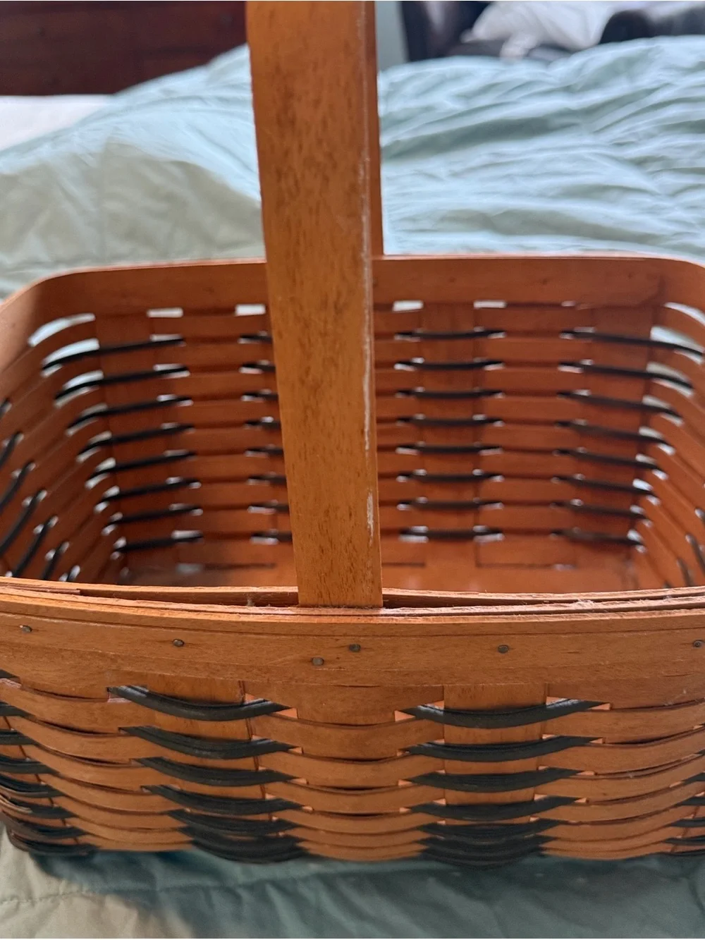 Longaberger Two-Tone Woven Basket in Brown and dark green.